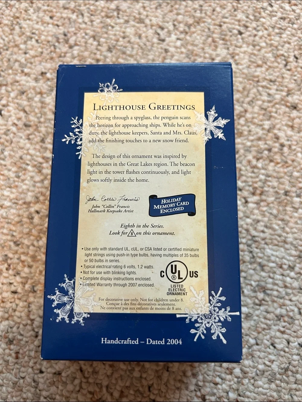 2004 Hallmark Lighthouse Greetings Ornament with flashing magic light.